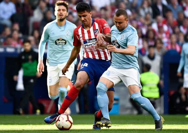 Spanish midfielder Rodri, who is a £60m transfer target for Manchester City, according to today's rumour mill. (PHOTO BY: Pierre-Philippe Marcou/Getty Images)