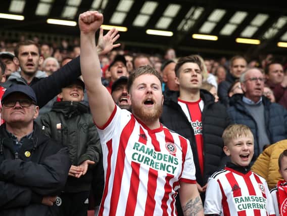Sheffield United fans show their support in the stands during the Sky Bet Championship match at Bramall Lane, Sheffield. PRESS ASSOCIATION Photo. Nick Potts/PA Wire.