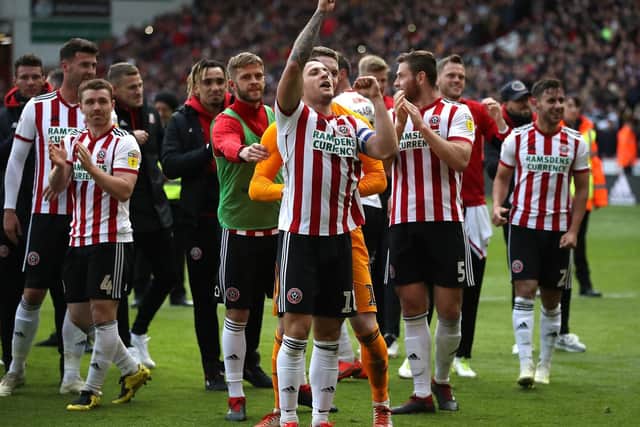 Sheffield United's Billy Sharp (centre) celebrates after the final whistle during the Sky Bet Championship match at Bramall Lane, Sheffield. Nick Potts/PA Wire.