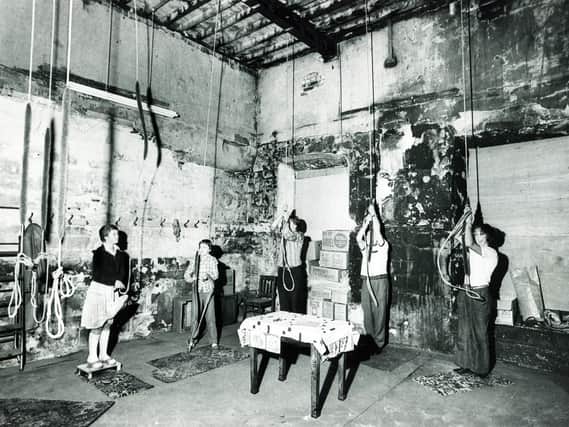 The Sheffield Cathedral bells ring once more after the fire.  This picture shows (from left) Helen Sparks (12), Lucy Johnston (12), Mr Ron Johnston, Mr Herbert Chaddock and Mr David Munday, as they ring out the first chords. Fire damage can be seen on the walls and in the roof timbers, July 26, 1979