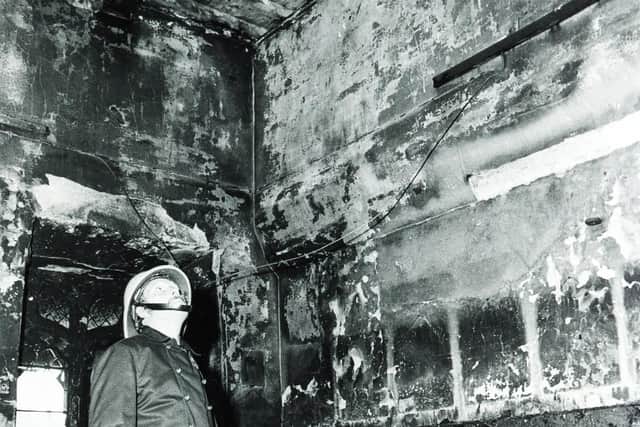 Sheffield Cathedral fire July 17, 1979A fireman surveys the damage in the tower after the fire
