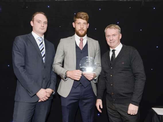 Will Evans received the Sheffield Star Chesterfield Player of the Year award from boss John Sheridan