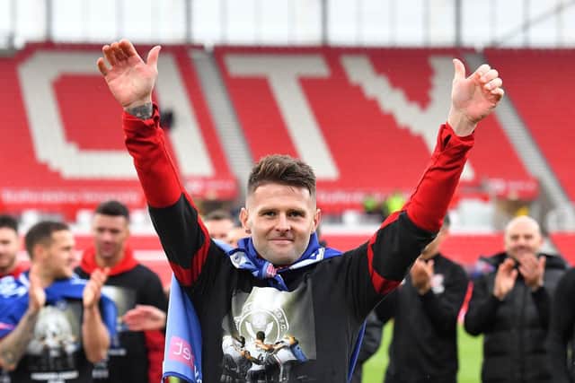Sheffield United's Oliver Norwood celebrates promotion to the Premier League: Dave Howarth/PA Wire.
