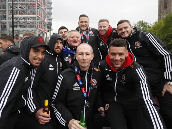 Management and players during the Sheffield United open top bus parade: Simon Bellis/Sportimage