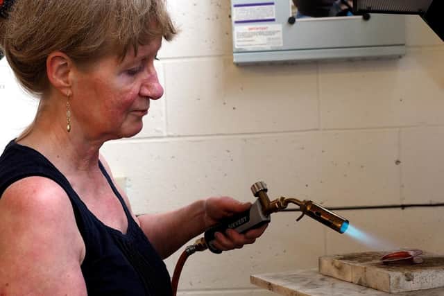 Open Up Sheffield 2019 at Manor Oaks art studios: Annette Petch at work on silver jewellery
