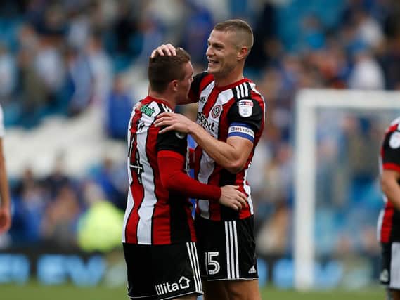 John Fleck and Paul Coutts of Sheffield Utd celebrate victory over Wednesday at Hillsborough in September 2017. Picture: Simon Bellis/Sportimage