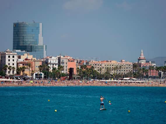 The Barceloneta beach of Barcelona with tourists and residents (JOSEP LAGO/AFP/Getty Images)
