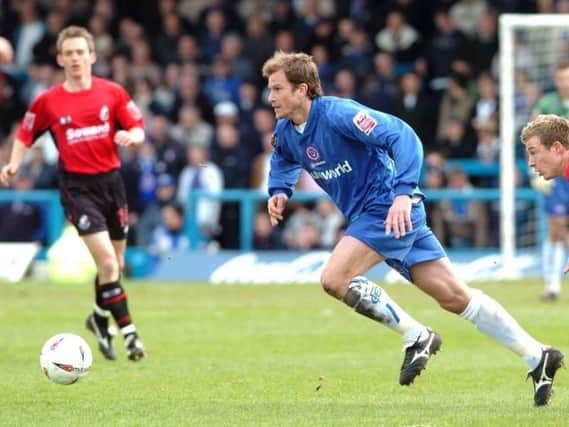 Shane Nicholson in action for Town