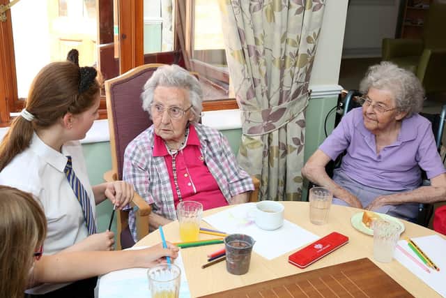 Pupils from Wales High School visit and spend time with some of the residents at Ladyfield House (Photo: Glenn Ashley)