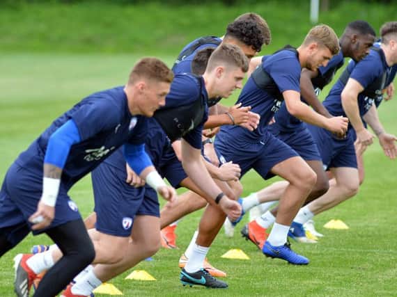 Dan Wallis, left, taking part in pre-season training with Chesterfield yesterday