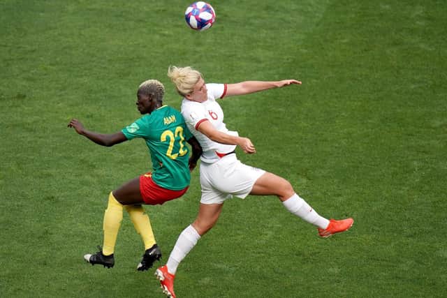 England's Millie Bright (right) and Cameroon's Michaela Abam (left) during the FIFA Women's World Cup, round of Sixteen match at State du Hainaut, Valenciennes. Picture: John Walton/PA Wire.