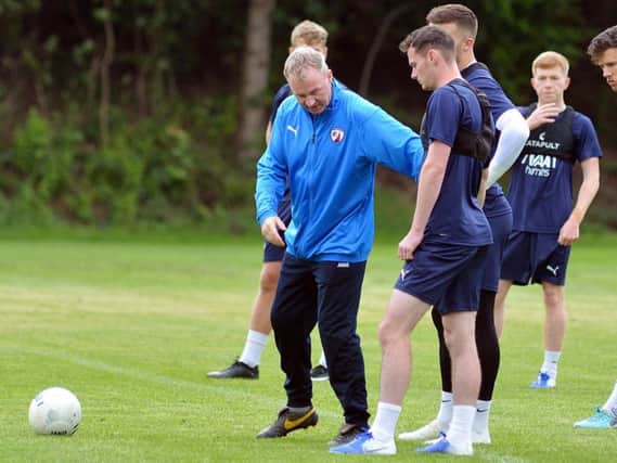 John Sheridan working with his new-look Spireites squad