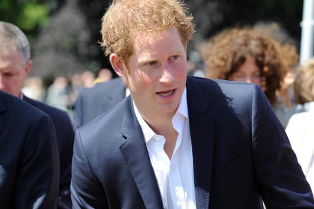 Prince Harry talks to the crowd at the Grand Depart at Harewood House, near Leeds, at the start of the 2014 Tour de France. PRESS ASSOCIATION Photo. Picture date: Saturday July 5, 2014. See PA story SPORT Tour . Photo credit should read: Asadour Guzelian/Daily Telegraph/PA Wire