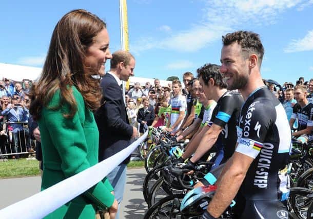 The Duchess of Cambridge talks to cyclist Mark Cavendish at the Grand Depart at Harewood House, near Leeds.