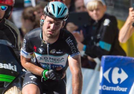 Omega Pharma-Quick Step Mark Cavendish rides over the finish line in Harrogate after crashing out of the final sprint of stage one of the Tour de France in Harrogate, Yorkshire. PRESS ASSOCIATION Photo. See PA story CYCLING Tour. Picture date: Saturday July 5, 2014. Photo credit should read: Tim Ireland/PA Wire