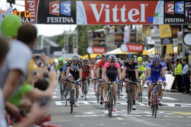 Tour de France 2014 Stage 2 - Sheffield Motorpoint Arena Finish Line
Geraint Thomas, second-right among the second pack to come through across the finish
