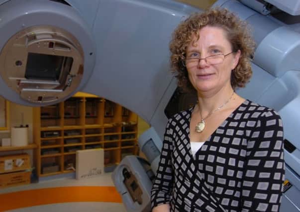 Dr Patricia Fisher with the Linear Accelerator at Weston park Hospital