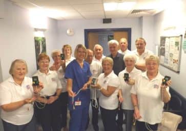 Members of the cardiac rehabilitation interest group present Scunthorpes cardiac rehabilitation department with five heart monitors. From left: Jan Ogiluie, vice-chairman, Val Rowbotham, treasurer, Brenda Johnson, Grace Mcfeely, Liz Tilley, chief cardiac physiologist, Sidney Johnson, Dave Ogiluie, Mickie OToole, chairman, Howard Hocknell, Trevor Rowbotham, Michael Clark, Joan Johnson and Pauline Cox.