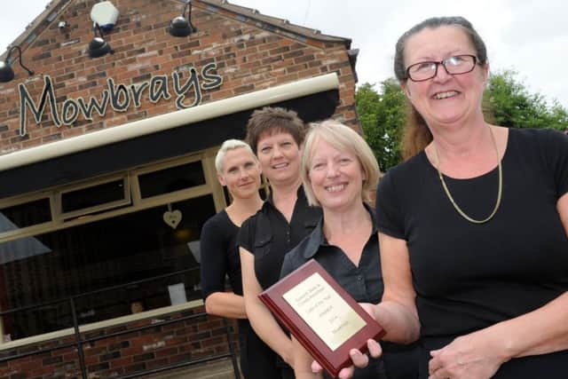 (r-l) Catherine Simpson, Kathryn Holmes, Karen Law, and Gail Hughes, of Mowbrays, Haxey, with their award for cafe of the year. Picture: Andrew Roe