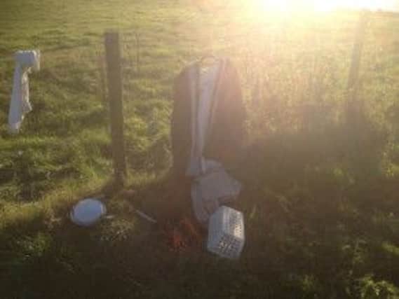 Pictured is the clothing which was found next to the pond.