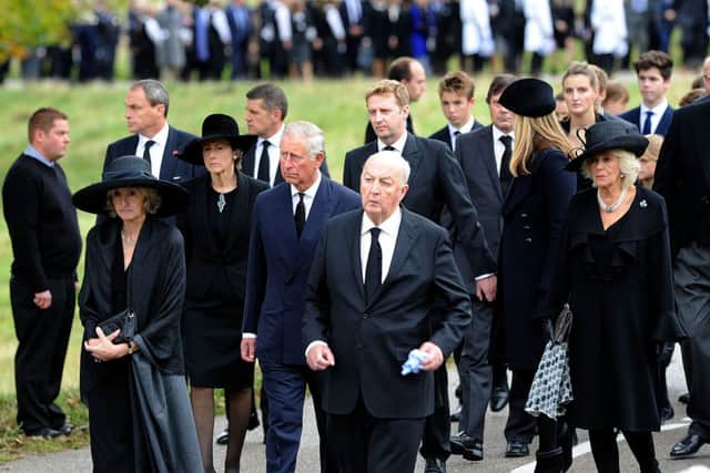 Prince Charles and Camilla at the funeral. PIC: Scott Merrylees