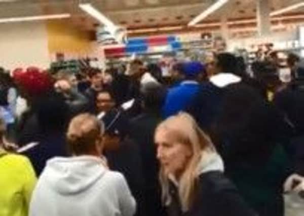 Bargain hunters scramble for deals at Tesco in the Wicker