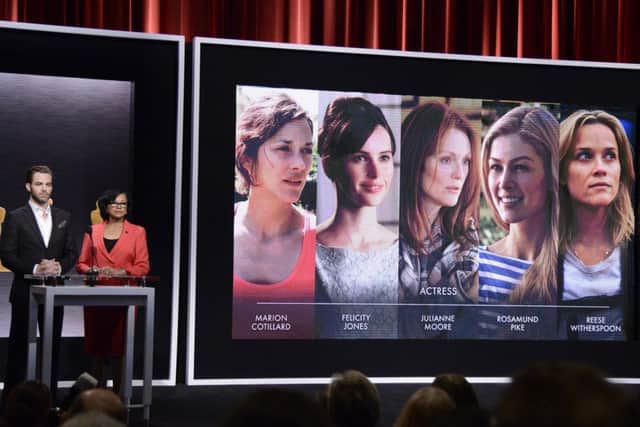 Chris Pine, left, and Academy President Cheryl Boone Isaacs announce the Academy Awards nominees for best actress in a leading role at the 87th Academy Awards nomination ceremony on Thursday, Jan. 15, 2015 in Beverly Hills, Calif. The 87th Annual Academy Awards will take place on Sunday, Feb. 22, 2015 at the Dolby Theatre in Los Angeles. (Photo by Dan Steinberg/Invision/AP)