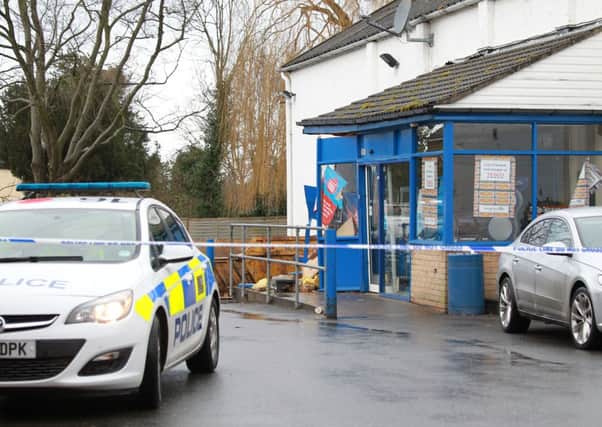 The Tesco store in Crowle has been sealed off by police after raiders using a mechanical digger struck to steal a cash machine.