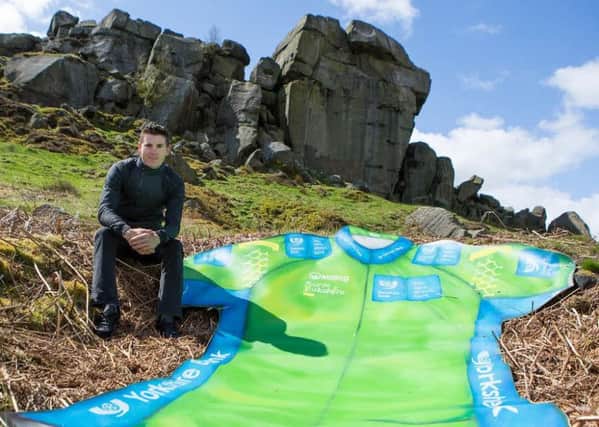 Team Sky cyclist Ben Swift is pictured with a giant Yorkshire Bank Sprinters Jersey near the Cow and Calf rocks in Ilkley Moor ahead of the inaugural Tour de Yorkshire cycling race. Picture by Alex Whitehead/SWpix.com -