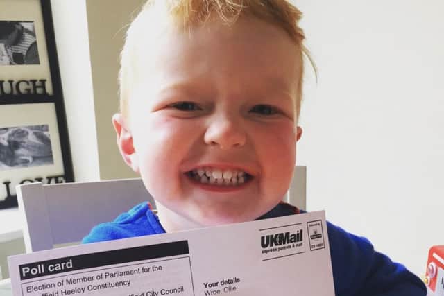 Ollie Wroe, 2 with his polling card