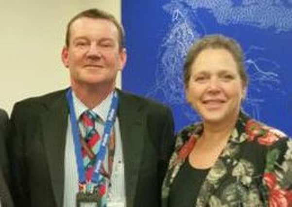Andy Foster, of South Yorkshire Police and Tracy Simmons, from Parkgate Mobility