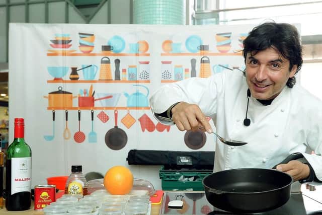 Jean-Christophe Novelli cooking for shoppers in The Merrion Centre, Leeds.