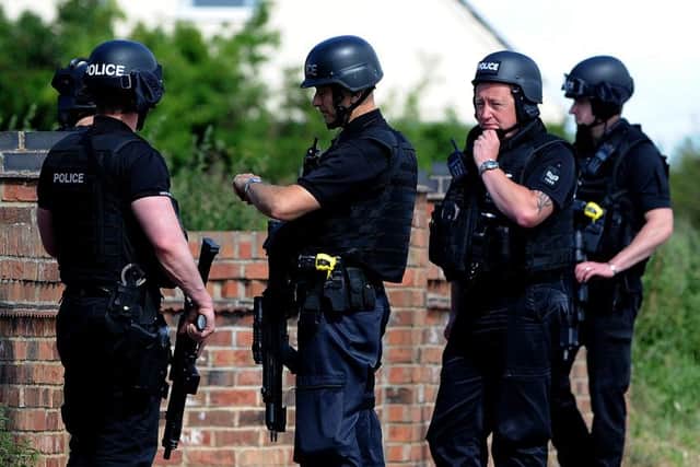 Armed police on Upperthorpe Road, Westwoodside were there are reports of an armed person on the loose. Picture: Andrew Roe