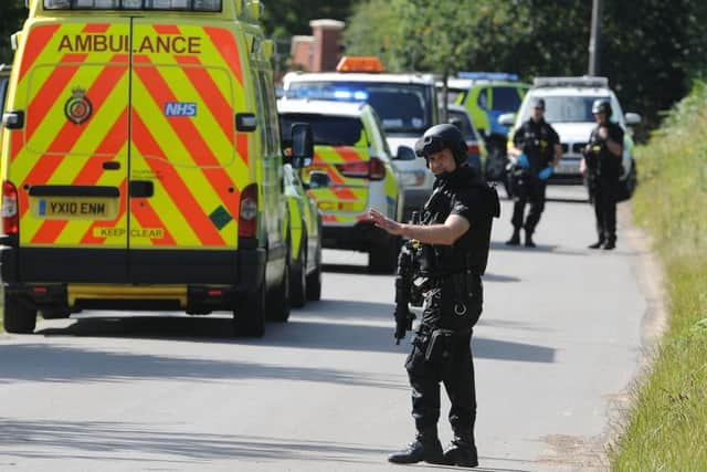 Armed police on The Cove, Westwoodside were there are reports of an armed person on the loose. Picture: Andrew Roe