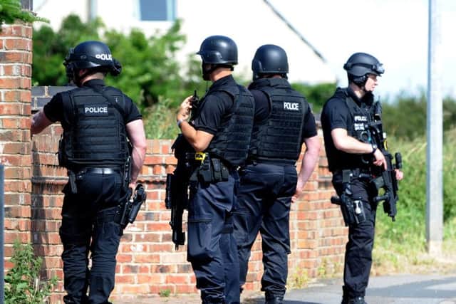 Armed police on Upperthorpe Road, Westwoodside. Picture: Andrew Roe