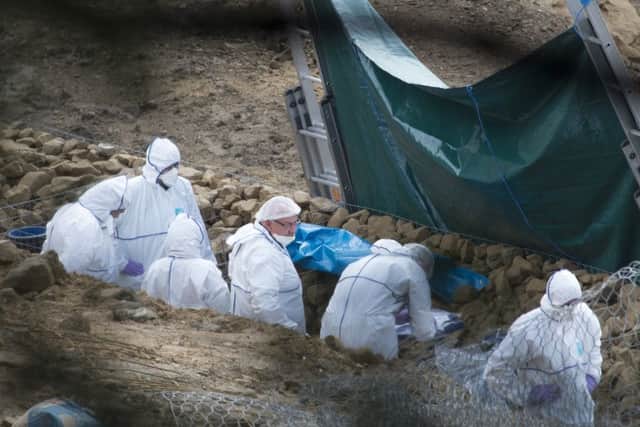 Scenes of Crime officers on a building site at Bank End Road in Worsborough, Barnsley where the body of a child has been found.Picture Dean Atkins