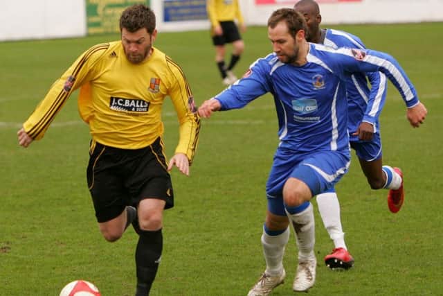 RUNNING OUT OF STEAM: Belper Town's Ryan Hindley on the run against Chasetown on Easter Monday. Two defeats over the weekend have cost the Nailers their play-off place.