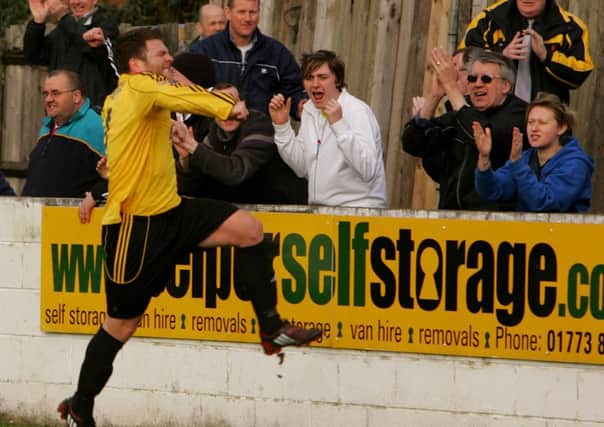 JUMP FOR JOY: Ryan Hindley celebrates netting from the penalty spot to put Belper Town 1-0 up against promotion rivals Witton Albion.