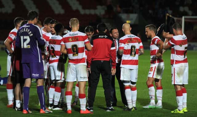 Doncaster's Paul Dickov gives his side a motivational speech ahead of extra-time against Ipswich