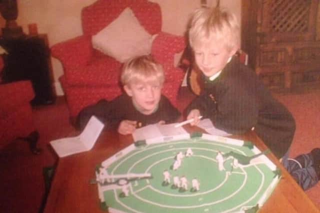 Then: Joe and Billy Root get an early taste of cricket
