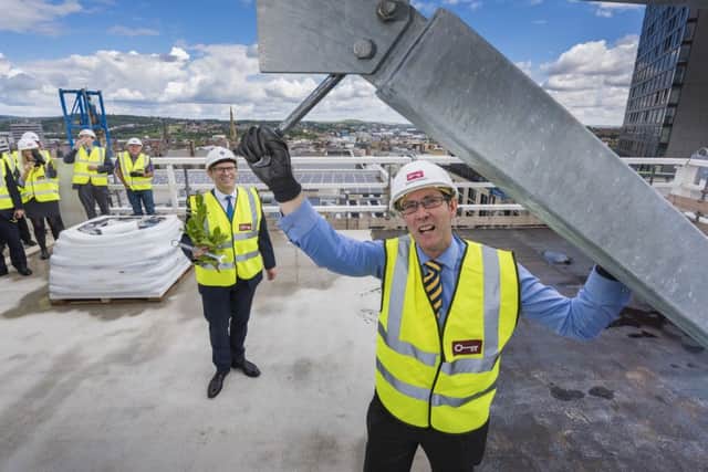 The topping out ceremony at 3 St Paul's Place - David Topham, managing director of CTP, is on the left and Coun Leigh Bramall, deputy leader of Sheffield City Council, is on the right.