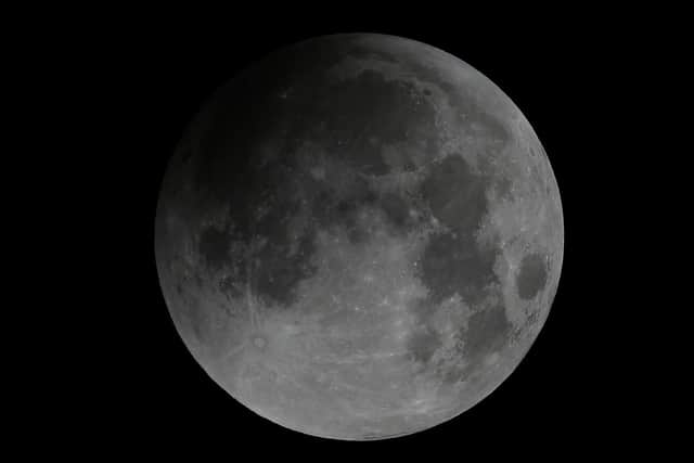 The earths shadow covers almost half the moon. Picture by rossparry.co.uk / Tom Maddick
