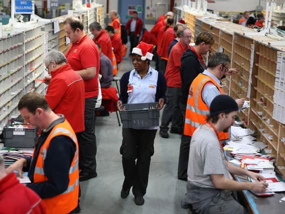 Royal Mail has announced plans to recruit 19,000 workers to help deal with the seasonal increase in post and parcels. Photo: Andrew Milligan/PA Wire