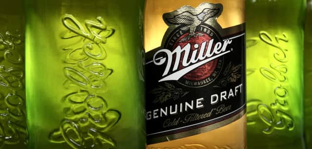 File photo dated 01/02/11 of SABMiller beer Miller and Grolsch, as beer giants SABMiller and Budweiser brewer Anheuser-Busch InBev have "agreed in principle" on a £68 billion blockbuster tie-up to create the world's biggest drinks firm.  Photo: David Jones/PA Wire