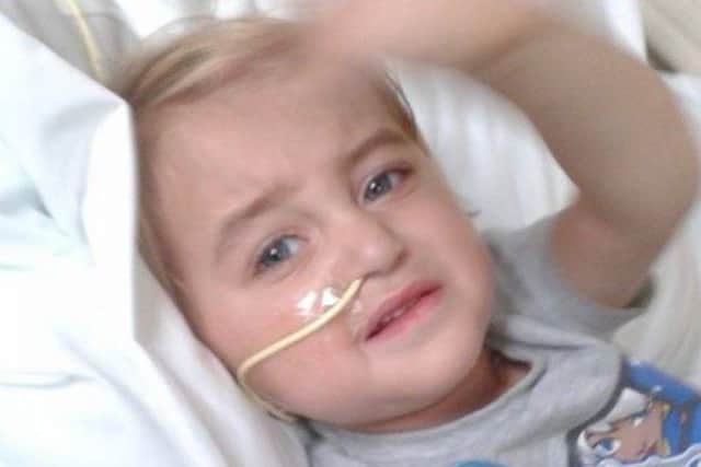Morgan Gray, two, has an inoperable brain tumour. His family are now trying to raise money to take the Matlock youngster on holiday.