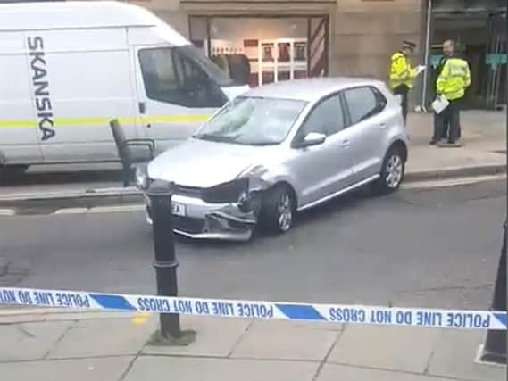 The car ploughed into a group of people in Guildford, Surrey.