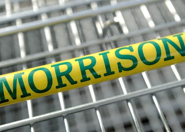 Morrisons insisted it was "moving at pace" to turn around trading as it revealed another hefty slide in sales.