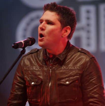 Scouting for Girls frontman Roy Stride performing at the Sheffield city centre Christmas lights switch-on event in 2010. Picture: Steve Ellis.