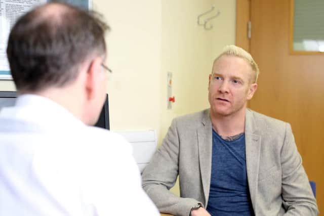 Olympian Iwan Thomas talks to Dr. Nicholas Hopkinson, clinical lead for Chronic Obstructive Pulmonary Disease (COPD), to learn about COPD as part of Public Health England's Smokefree campaign, at the Royal Brompton Hospital in London. David Parry/PA Wire