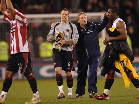Neil Warnock celebrates his sides win over Arsenal in 2006 with substitute keeper Phil Jagielka